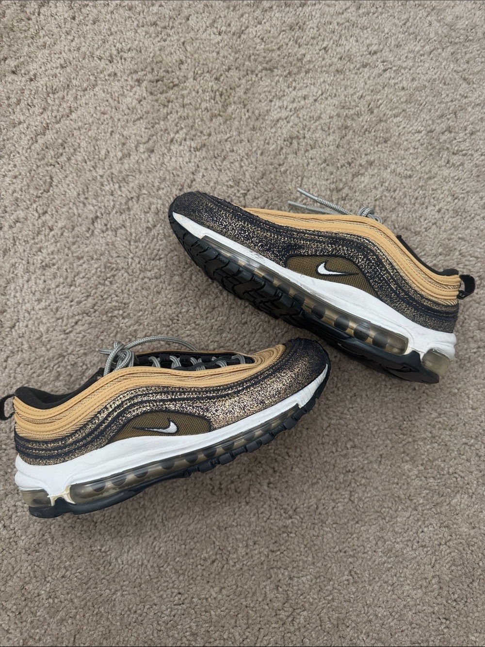 Nike Women’s Sneakers in Black and Gold